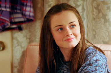 Rory Gilmore adolescente, com um semblante otimista e sonhador.